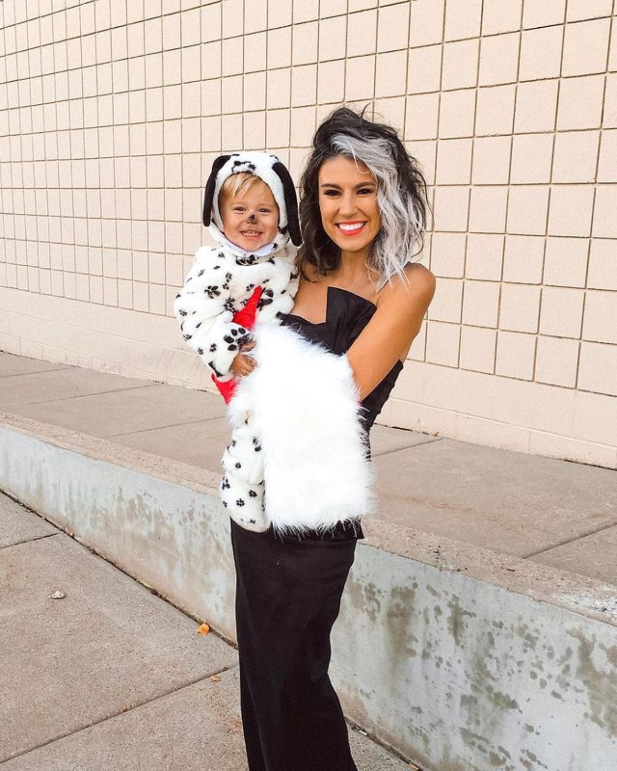 Cruella And A Dalmatian costumes