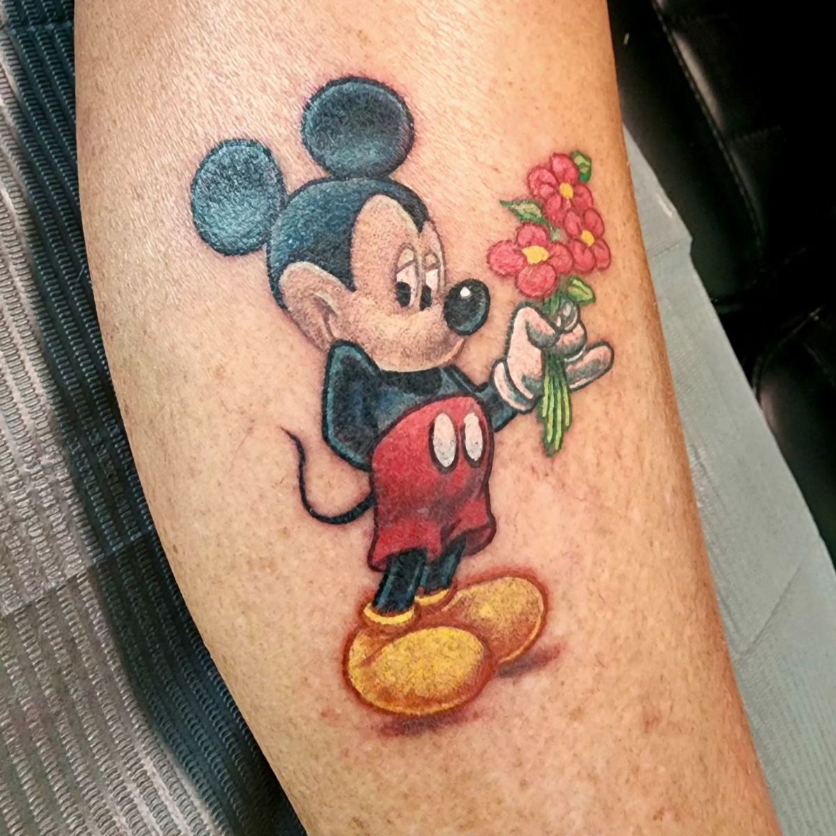 Mickey Holding Flowers Tattoo